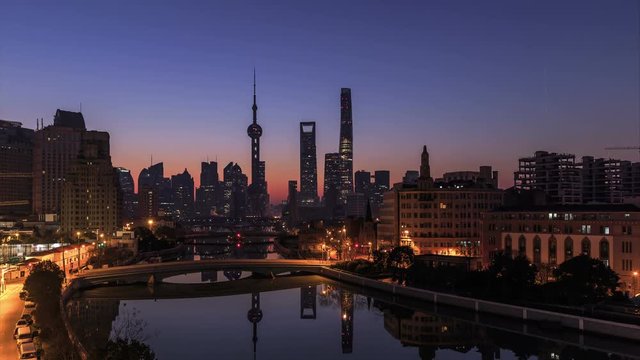Timelapse of Shanghai skyline and cityscape at sunrise