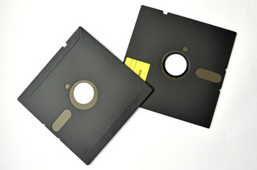 several floppy disks on a white background