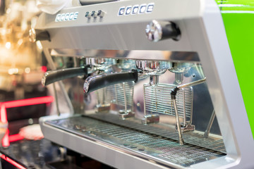 Automatic green coffee machine in coffeeshop or restaurant.