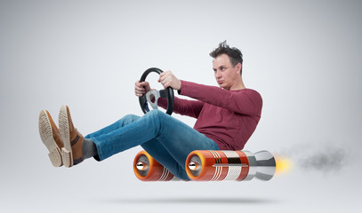 Funny man car driver with a wheel, concept of alternative transport