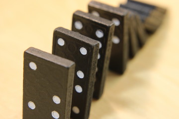 falling dominoes. the domino principle. the domino game...