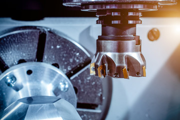 Modern CNC machine tool, face milling cutter close-up.