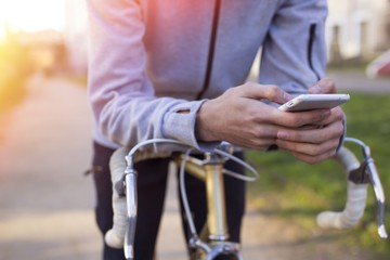 young bike with outdoor mobile phone