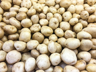 yellow fresh potatoes in farmers store