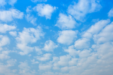 Beautiful fluffy clouds with blue sky background.