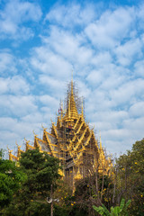 Temple(Wat Chan West) in Beautiful fluffy cloudsat Phitsanulok, Thailand.