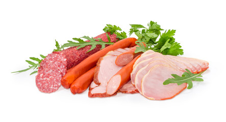 Different cooked meat products with greens on a white background