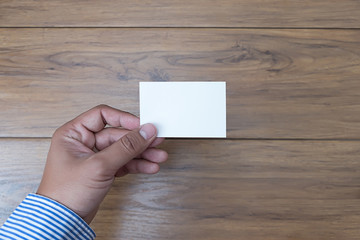 Obraz premium Hand hold blank white card mockup Business branding.