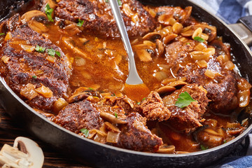 salisbury beef steaks in a skillet
