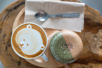 Hot coffee cup on wooden table