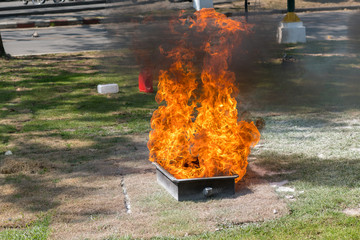 Demonstration of the fire with a fire extinguisher.