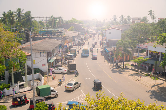 March 5, 2018. Hikkaduwa, Sri Lanka. Automobile traffic and people on the street.