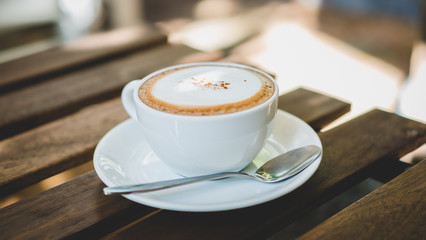 Coffee cup on wooden table Comfortable Vintage Breakfast