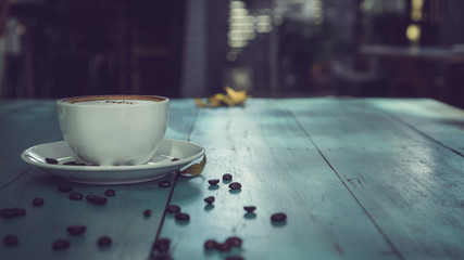 Coffee cup on wooden table With coffee Comfortable vintage breakfast. Relaxation, Coffee Break,selected focus.Vintage style