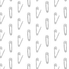 Hand drawn vector illustration of safety pin pattern on black background. 
