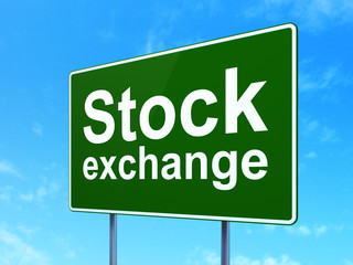 Finance concept: Stock Exchange on green road highway sign, clear blue sky background, 3D rendering