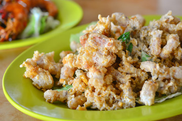 Chinese food baby squid fried with salted egg.