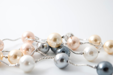 pearl necklace on white background