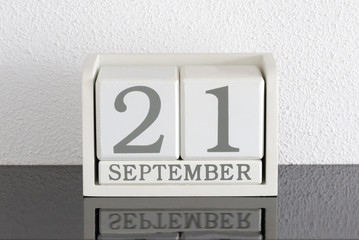 White block calendar present date 21 and month September