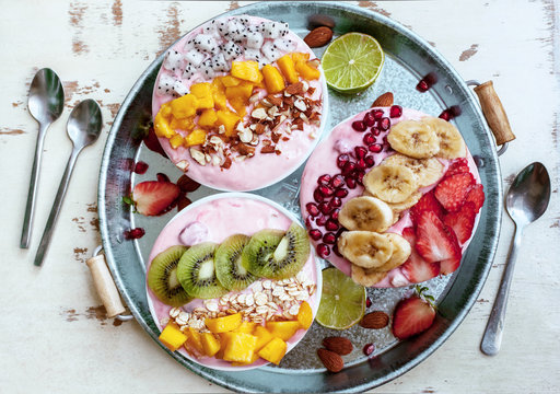 Smoothie bowls with tropical fruits