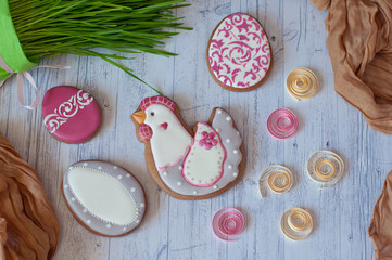 Top view on cute honey cookies for Easter on white table background