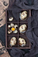 Different types of eggs on dark background. Easter concept