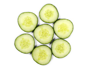 Cucumber slices isolated on white background, top view