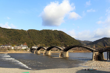 On the way to the iconic Kintai Bridge made of wood. On top of the hill is the Iwakuni Castle