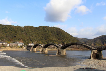 On the way to the iconic Kintai Bridge made of wood. On top of the hill is the Iwakuni Castle