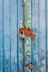 Close up of blue wooden door