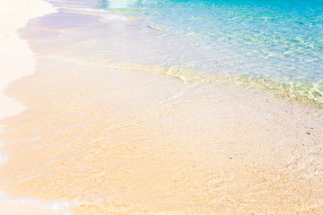 Wave of the sea on the sand beach