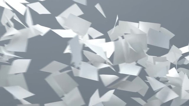 flying sheets of white paper	