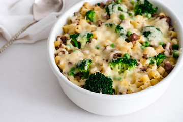 Casserole with pasta, meat, broccoli and Bechamel sauce under a cheese crust.