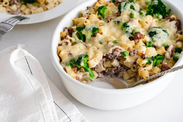 Casserole with pasta, meat, broccoli and Bechamel sauce under a cheese crust.