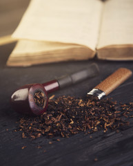 pipe smoking tobacco old book  toning photo