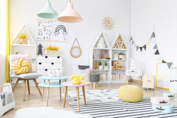 Spacious pastel kid's playroom interior © Photographee.eu