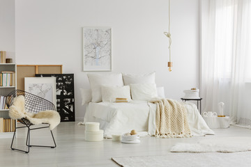 White bed in hipster interior