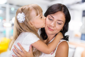 Happy mother and child girl