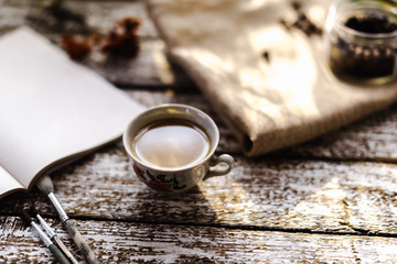 A cup of coffee in the morning sun.