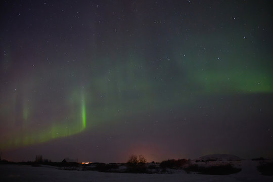 beautiful night sky with magnificent aurora borealis in iceland © LIGHTFIELD STUDIOS