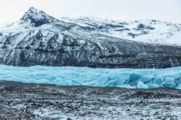 spectacular glacial landscape with mountains and Svinafellsjokull Glacier, Iceland