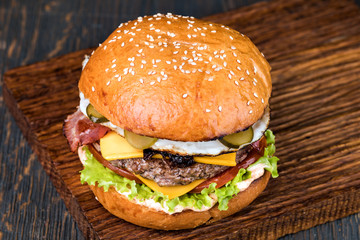 Burger on a wooden board