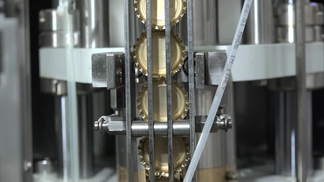 Set of bottle caps in the Automatic Beer Bottling Line.