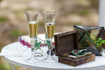 Wedding decor on the table. Box with rings