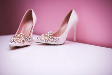 Elegant and stylish bridal shoes. Selective focus.