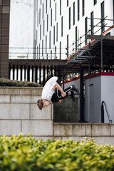 Freerunner Doing Flips in the City