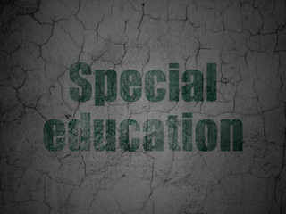 Learning concept: Green Special Education on grunge textured concrete wall background