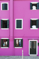 Purple facade of a house in Burano, Venice