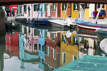 Fototapeta na wymiar Burano, Venice, Italy- houses reflection in the canal