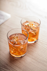 Fototapeta na wymiar Orange cold summer cocktail drink